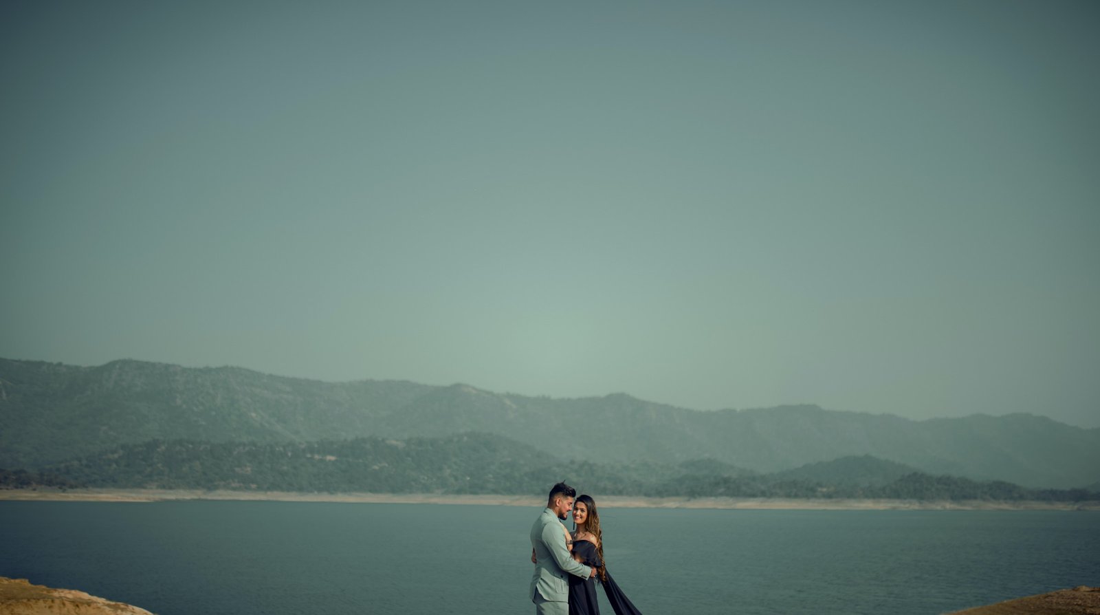Couple in beach landscape during outdoor pre-wedding shoot, Indian couple photography