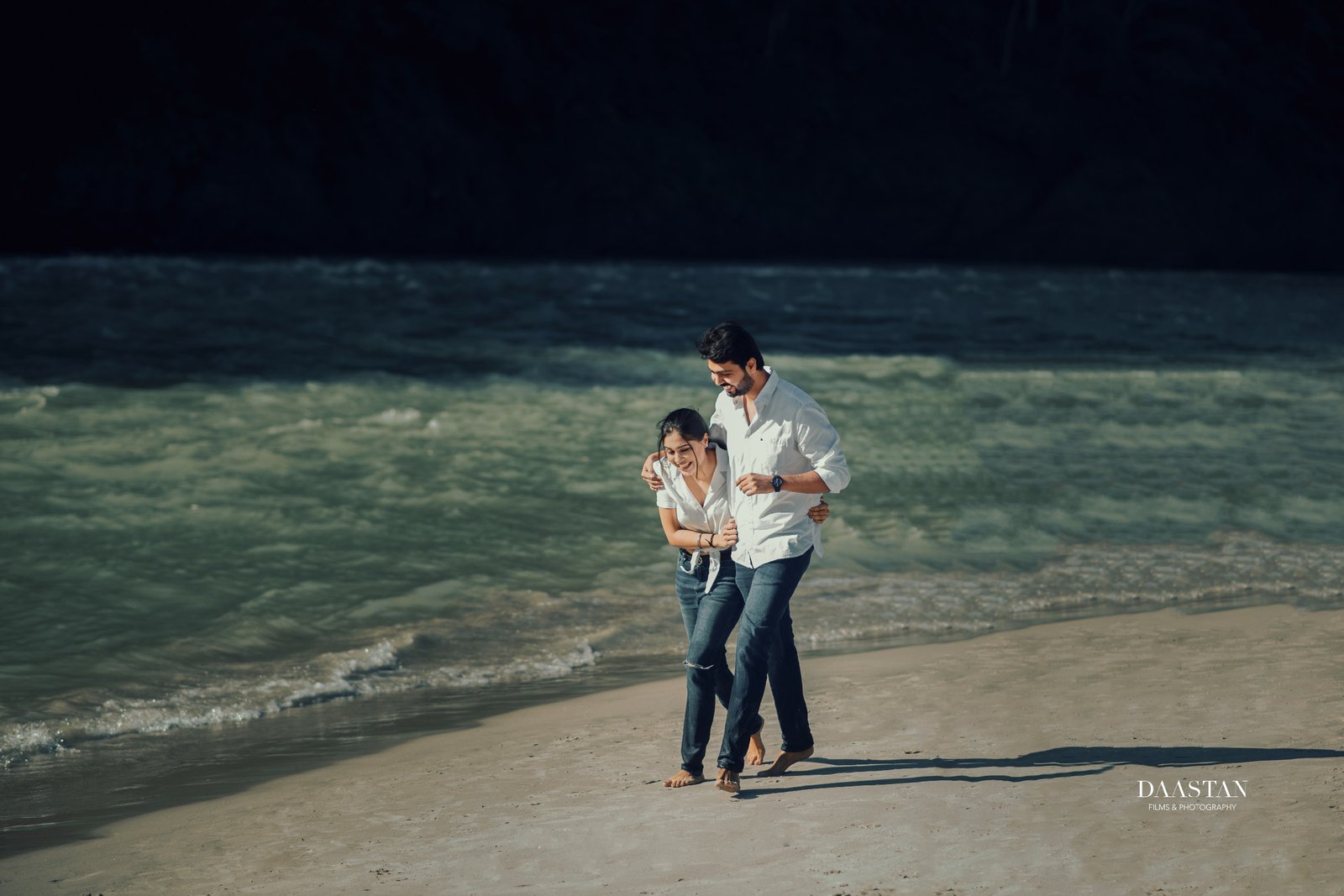 Couple at beach during outdoor pre-wedding shoot, Indian couple photography