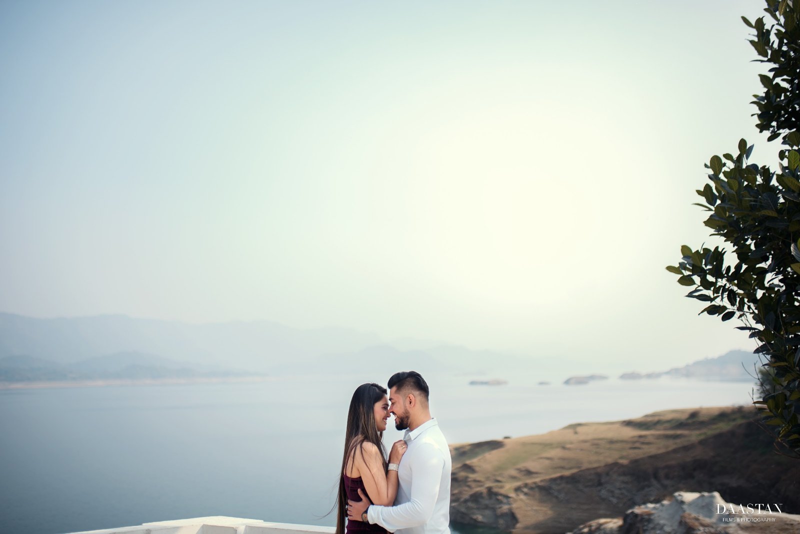 Couple at beach sunset during pre-wedding shoot, destination Indian couple photography