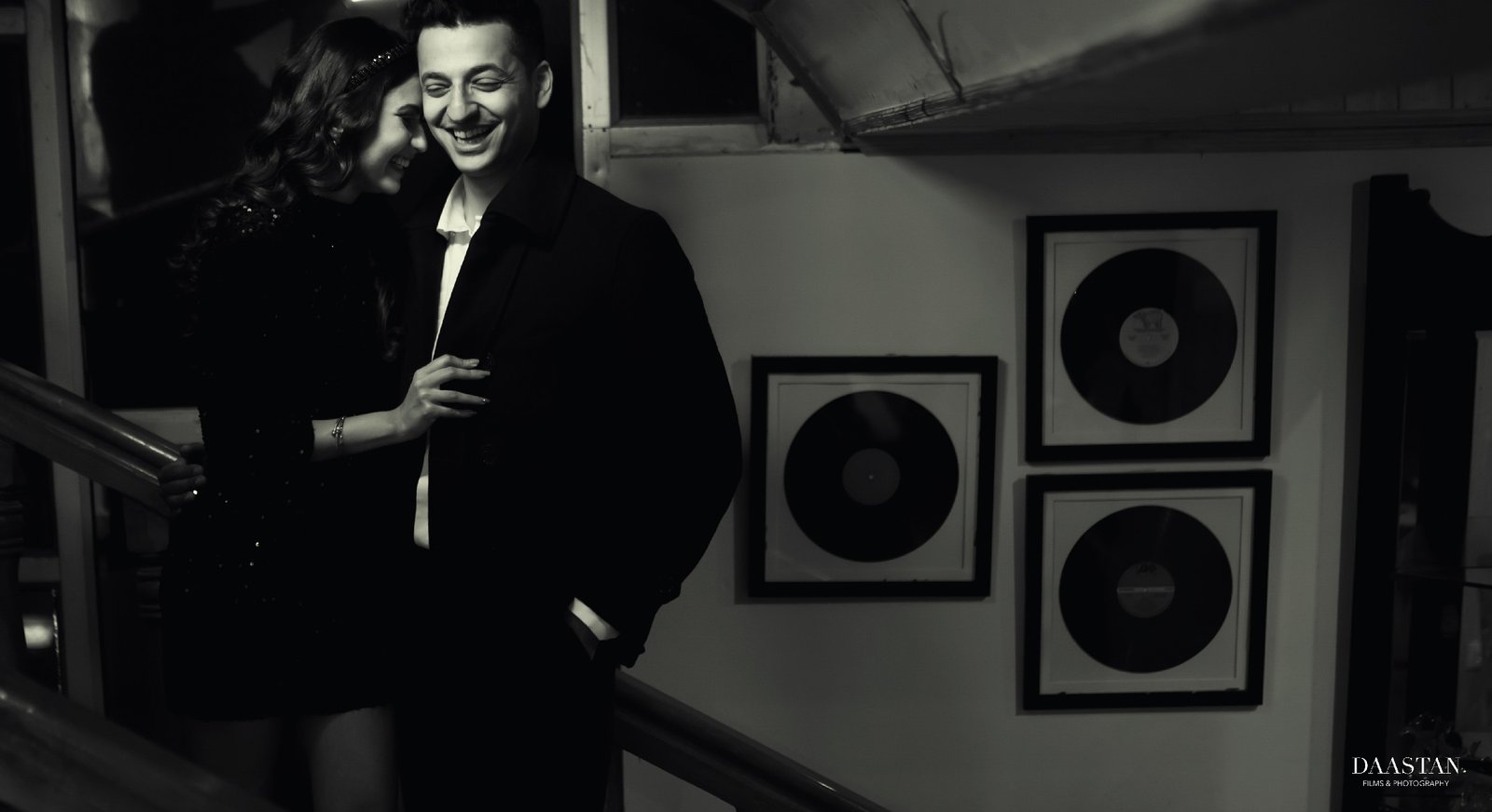 Black and white candid couple portrait in billiards bar, creative pre-wedding photography India