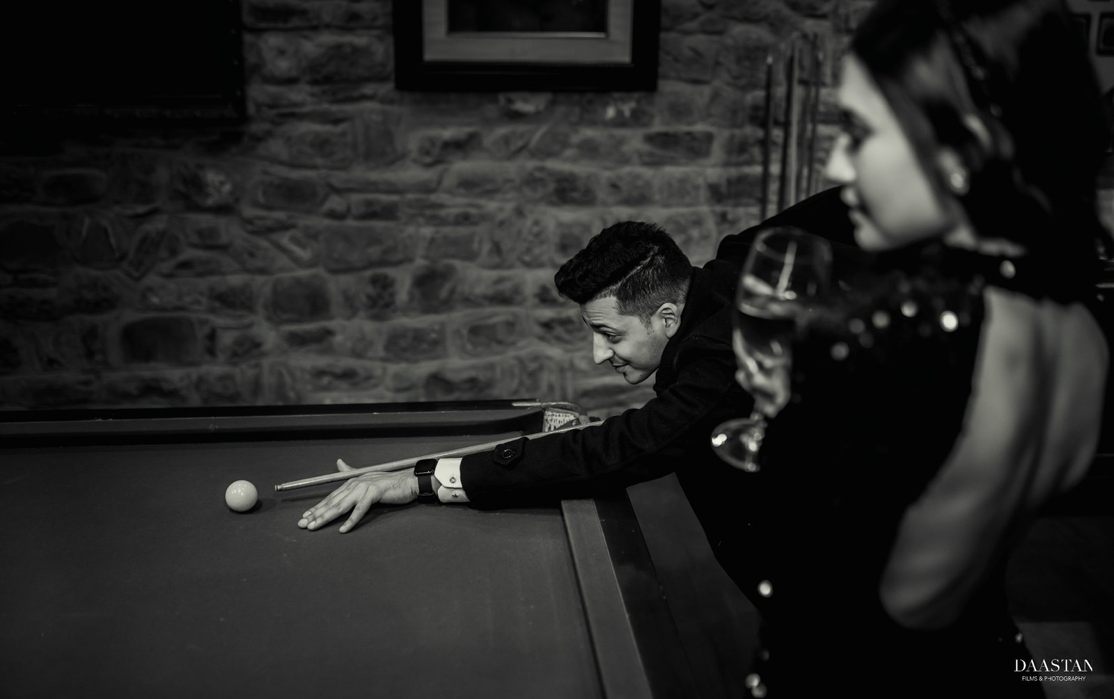 Romantic black and white indoor pre-wedding portrait, cinematic Indian couple photography