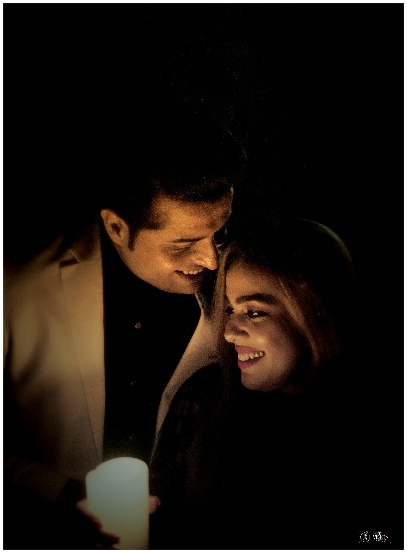 Dark moody indoor pre-wedding portrait of couple, cinematic Indian wedding production photography