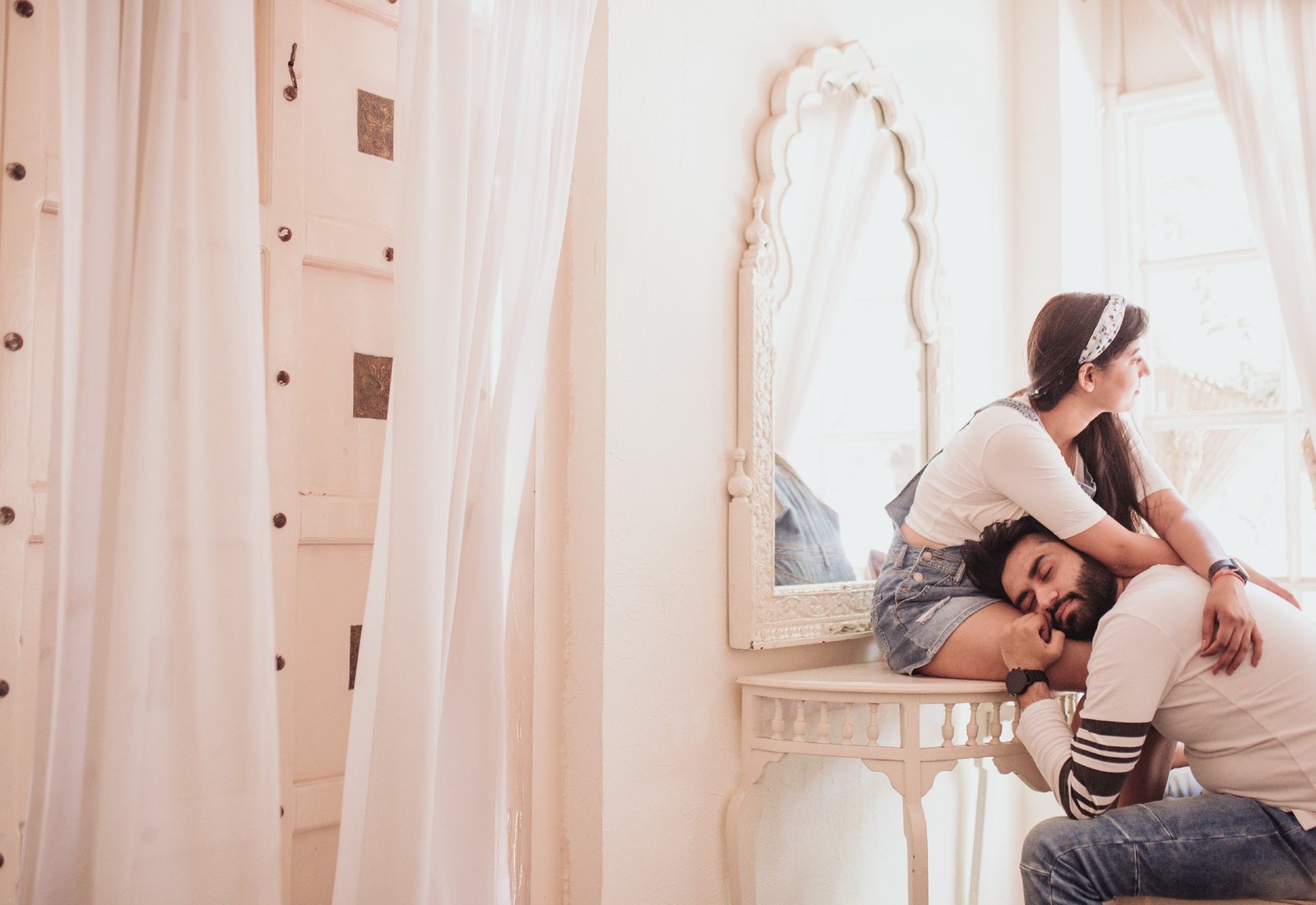 Creative mirror reflection pre-wedding portrait of couple, artistic Indian wedding photography