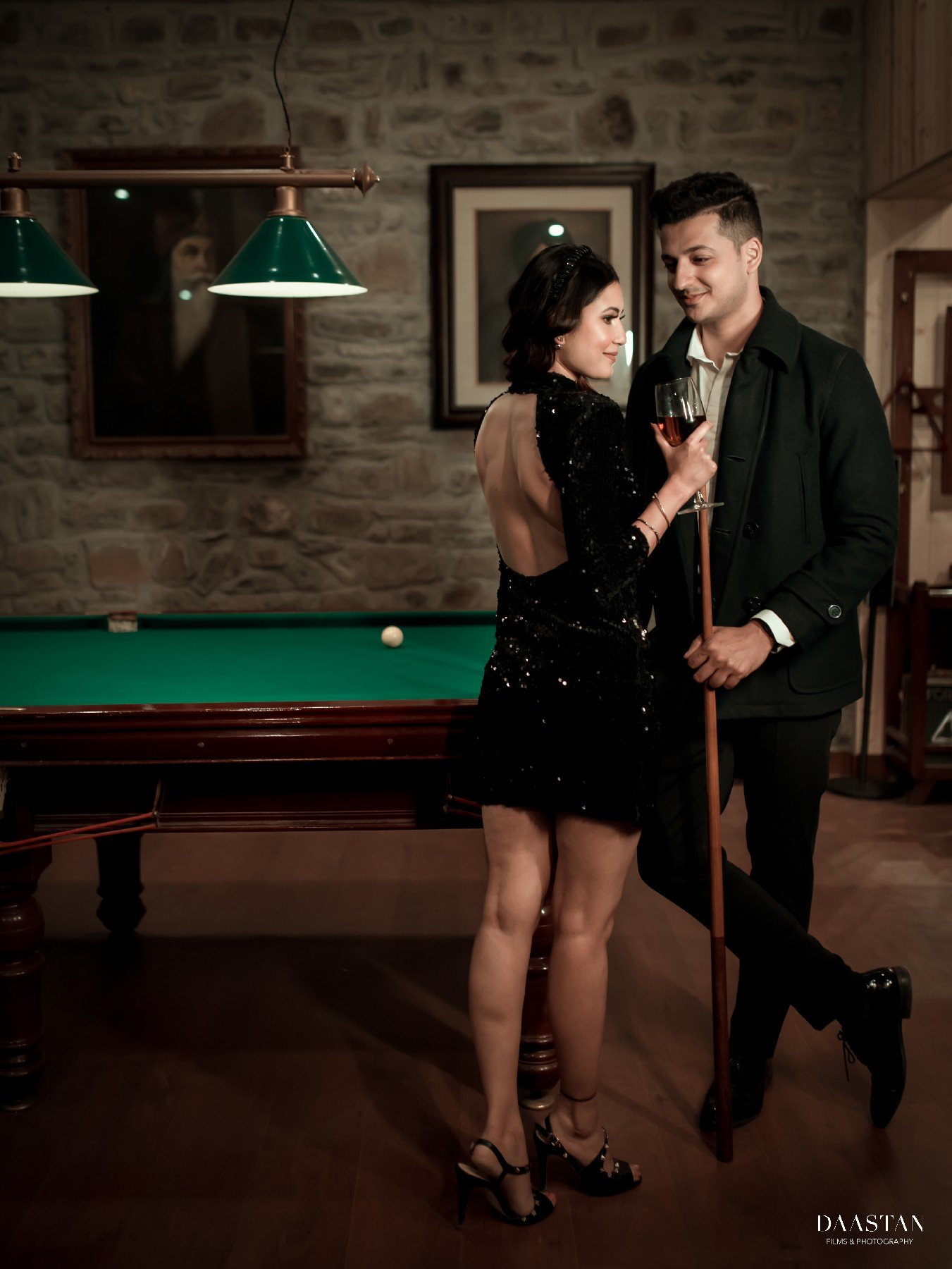 Stylish indoor pre-wedding portrait of couple, professional Indian wedding production house