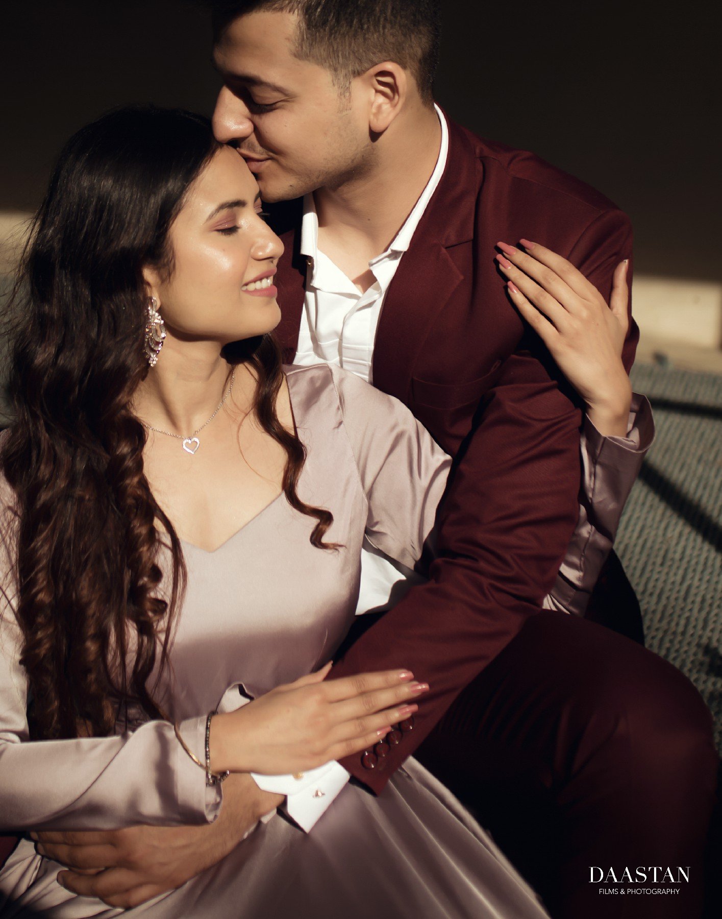 Romantic couple portrait in maroon suit during pre-wedding shoot, Indian photography