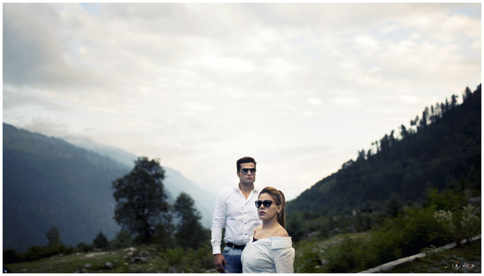 Couple on mountain highway during pre-wedding shoot, outdoor Indian couple photography