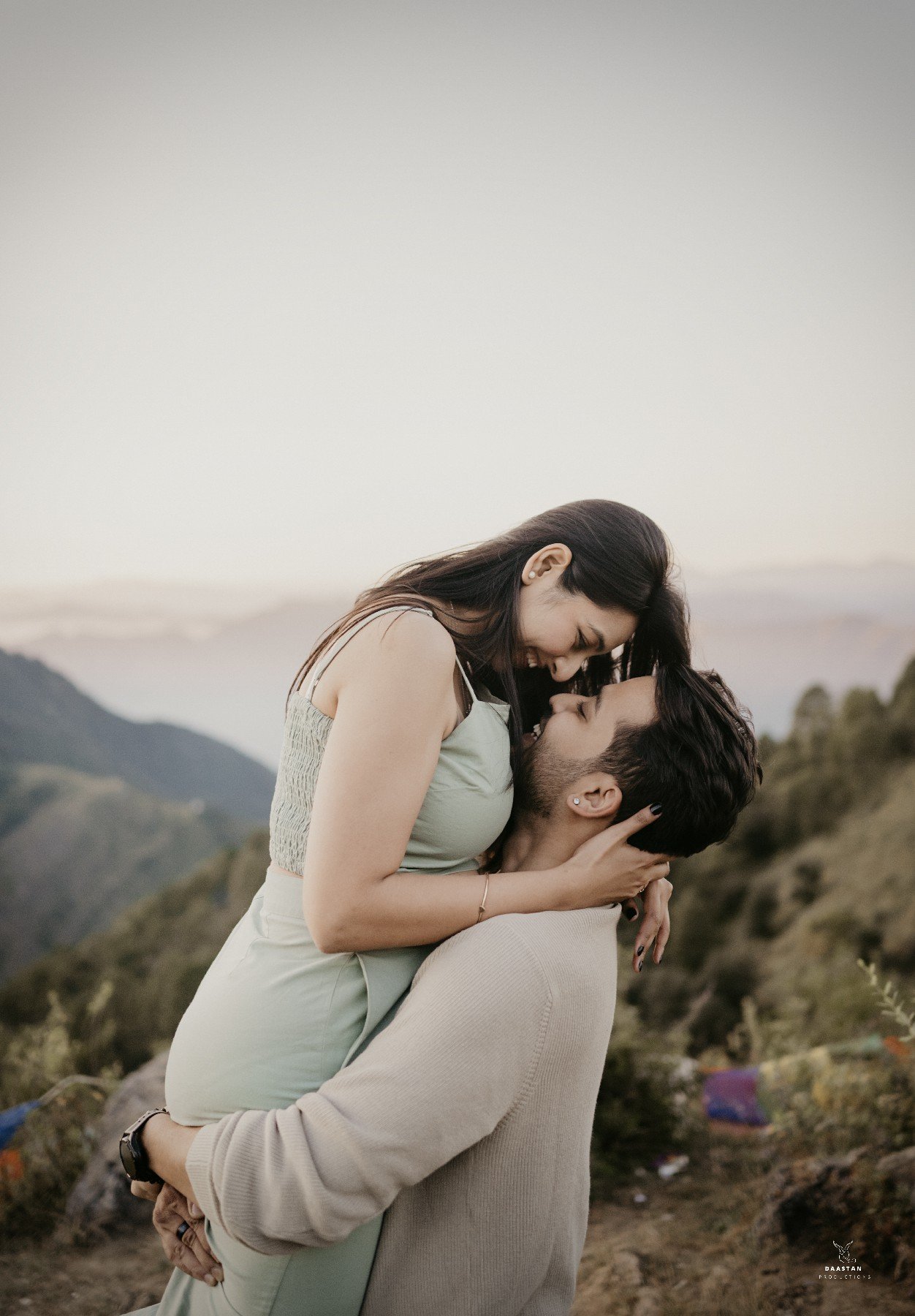 Couple portrait in mountain valley during pre-wedding shoot, Indian couple photography