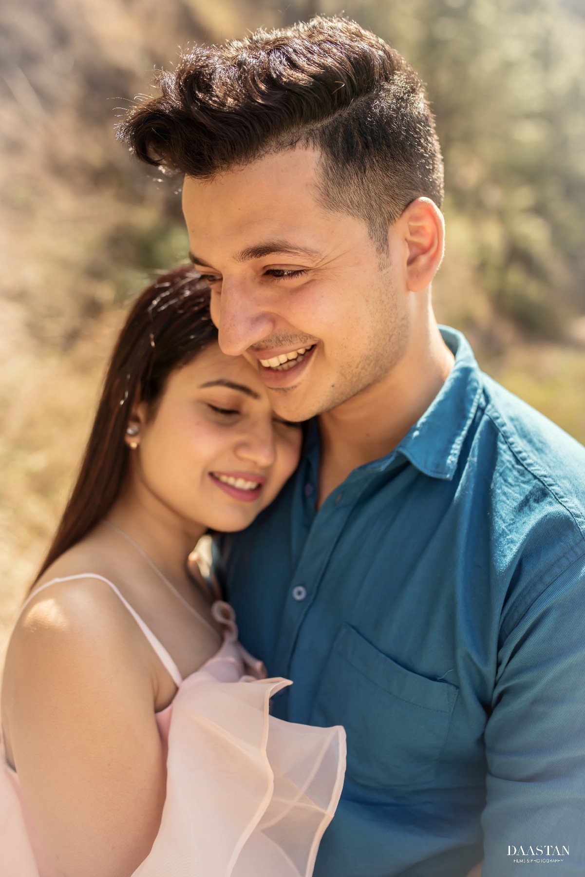 Casual outdoor pre-wedding portrait of couple, candid Indian couple photography
