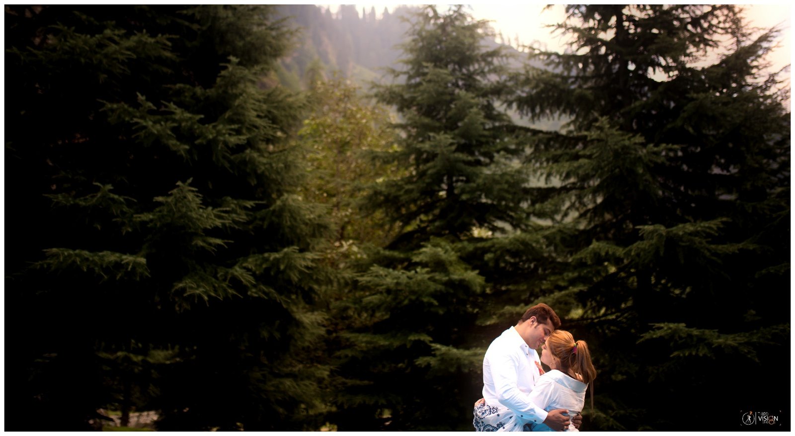 Couple silhouette in pine forest during pre-wedding shoot, cinematic Indian photography
