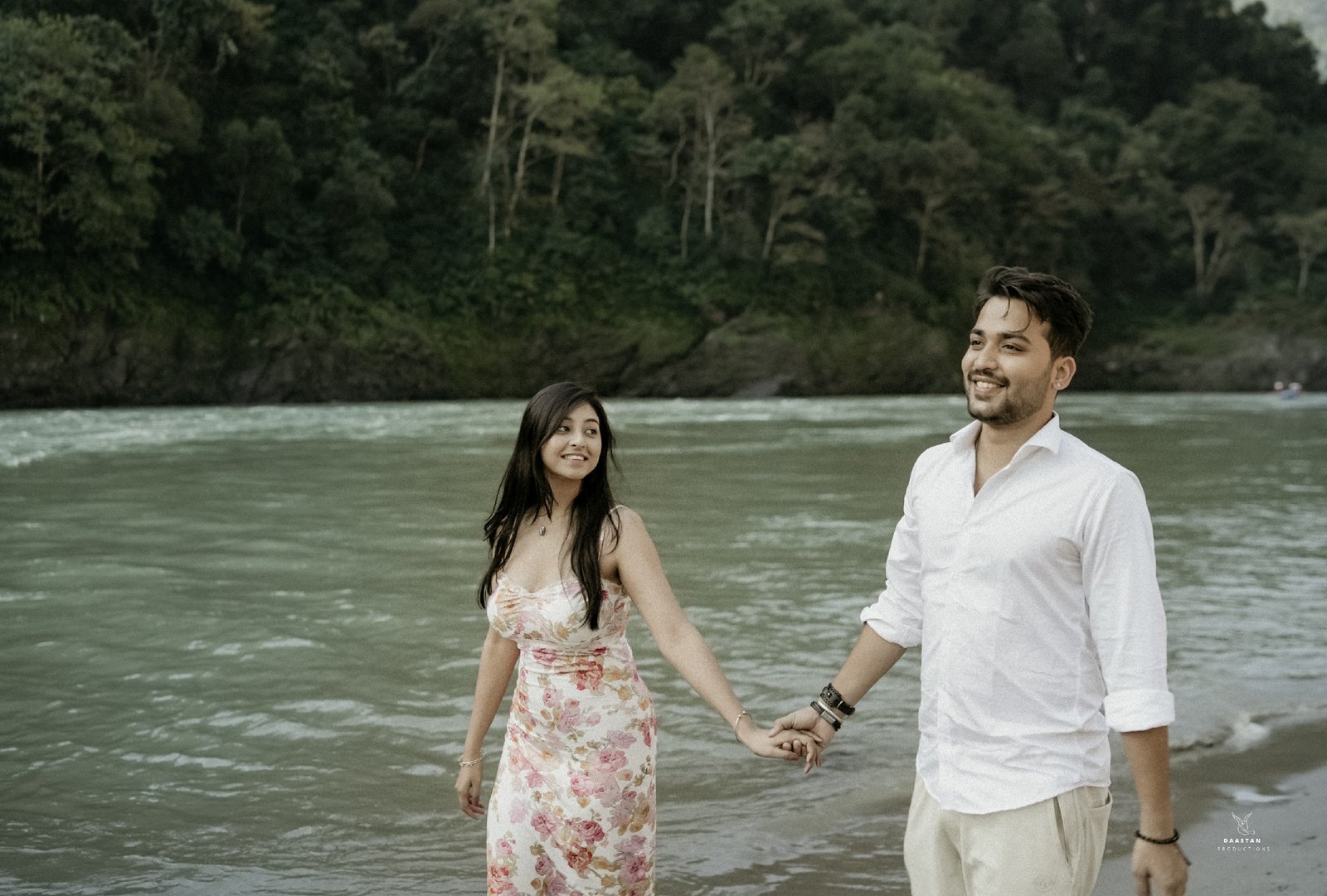 Couple outdoor portrait at riverside during pre-wedding shoot, natural Indian couple photography